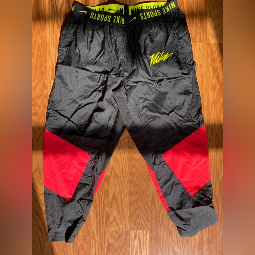 Black and pink Nike Track Pants